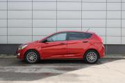 Красный Hyundai Solaris 1.4 AT (107 л.с.) 2014 фото 3