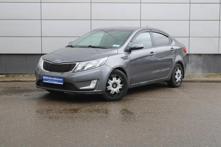 Серый Kia Rio 4-speed 1.6 AT (123 л.с.) 2012