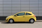 Желтый Opel Corsa 1.2 MT (85 л.с.) 2012 фото 4