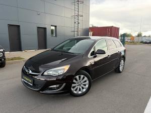 Коричневый Opel Astra 1.4 AT (140 л.с.) 2013