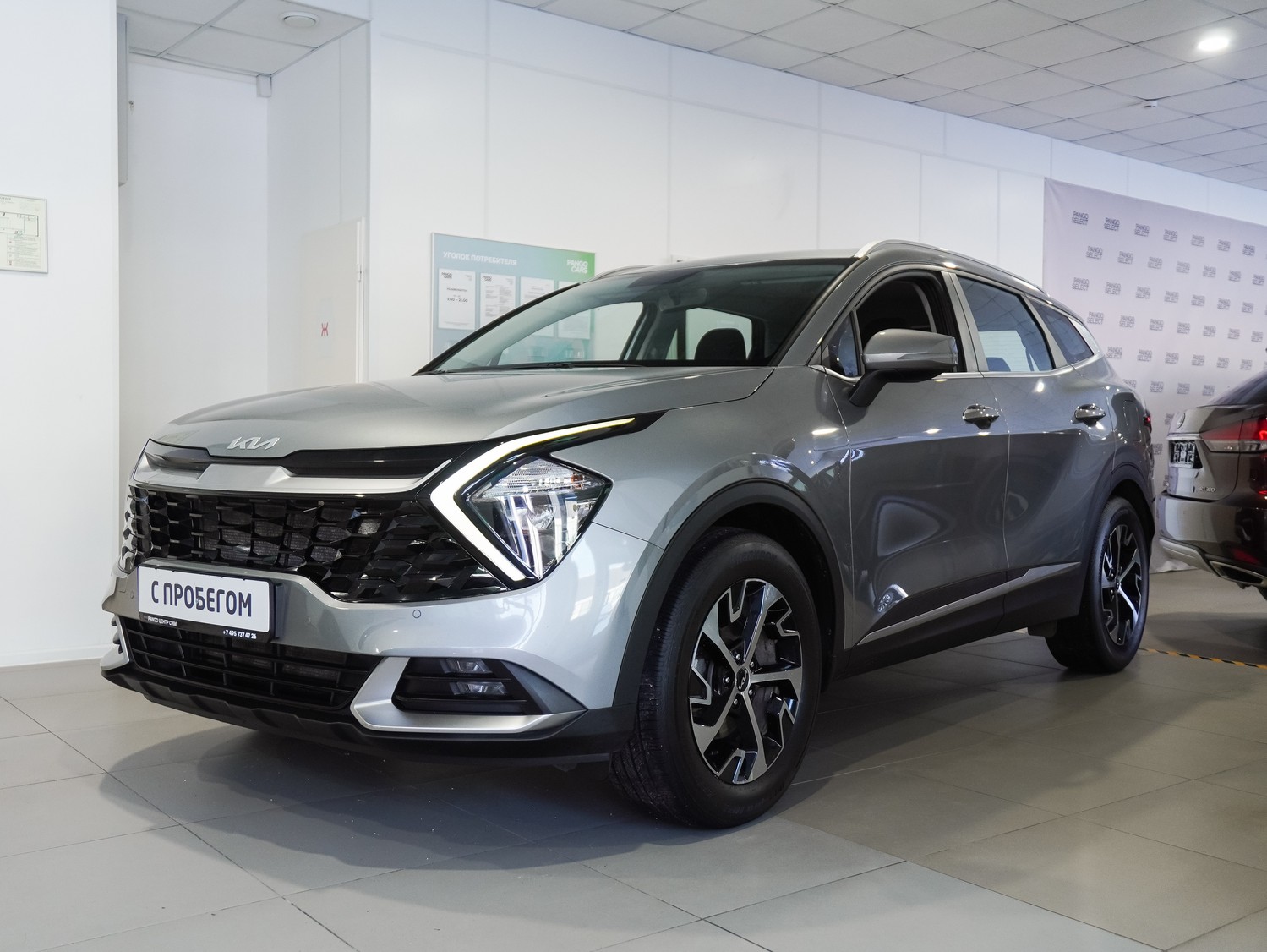 серый Kia Sportage, V 2.5 AT (190 л.с.) 4WD 2022