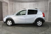 Серебряный Renault Sandero Stepway 1.6 MT (84 л.с.) 2014 фото 4