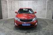 Красный Kia Rio 6-speed 1.6 MT (123 л.с.) 2014 фото 1