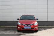 Красный Hyundai Solaris 1.4 AT (107 л.с.) 2014 фото 1