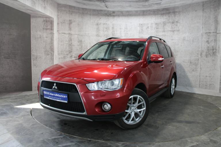 Красный Mitsubishi Outlander 2.4 CVT (170 л.с.) 4WD 2012