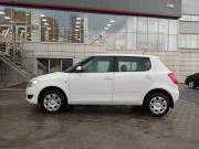 белый Skoda Fabia 1.2 MT (70 л.с.) 2013 фото 1