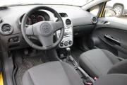 Желтый Opel Corsa 1.2 MT (85 л.с.) 2012 фото 9