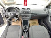 белый Skoda Fabia 1.2 MT (70 л.с.) 2013 фото 4