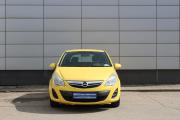 Желтый Opel Corsa 1.2 MT (85 л.с.) 2012 фото 1