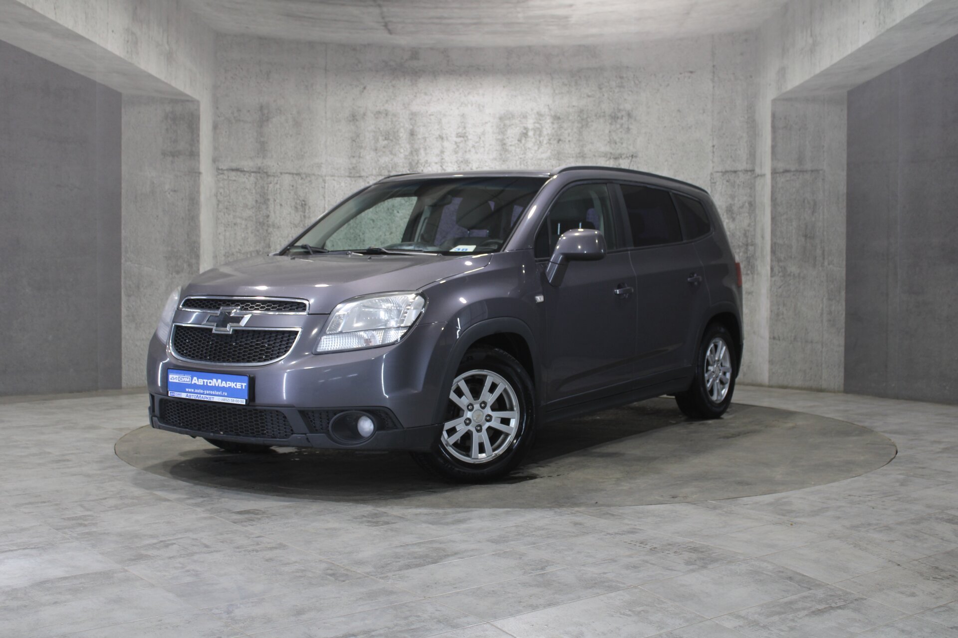 Серый Chevrolet Orlando 1.8 MT (141 л.с.) 2012