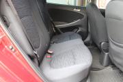 Красный Hyundai Solaris 1.4 AT (107 л.с.) 2014 фото 11