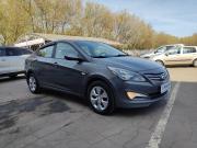 серый Hyundai Solaris 1.4 AT (107 л.с.) 2016 фото 2