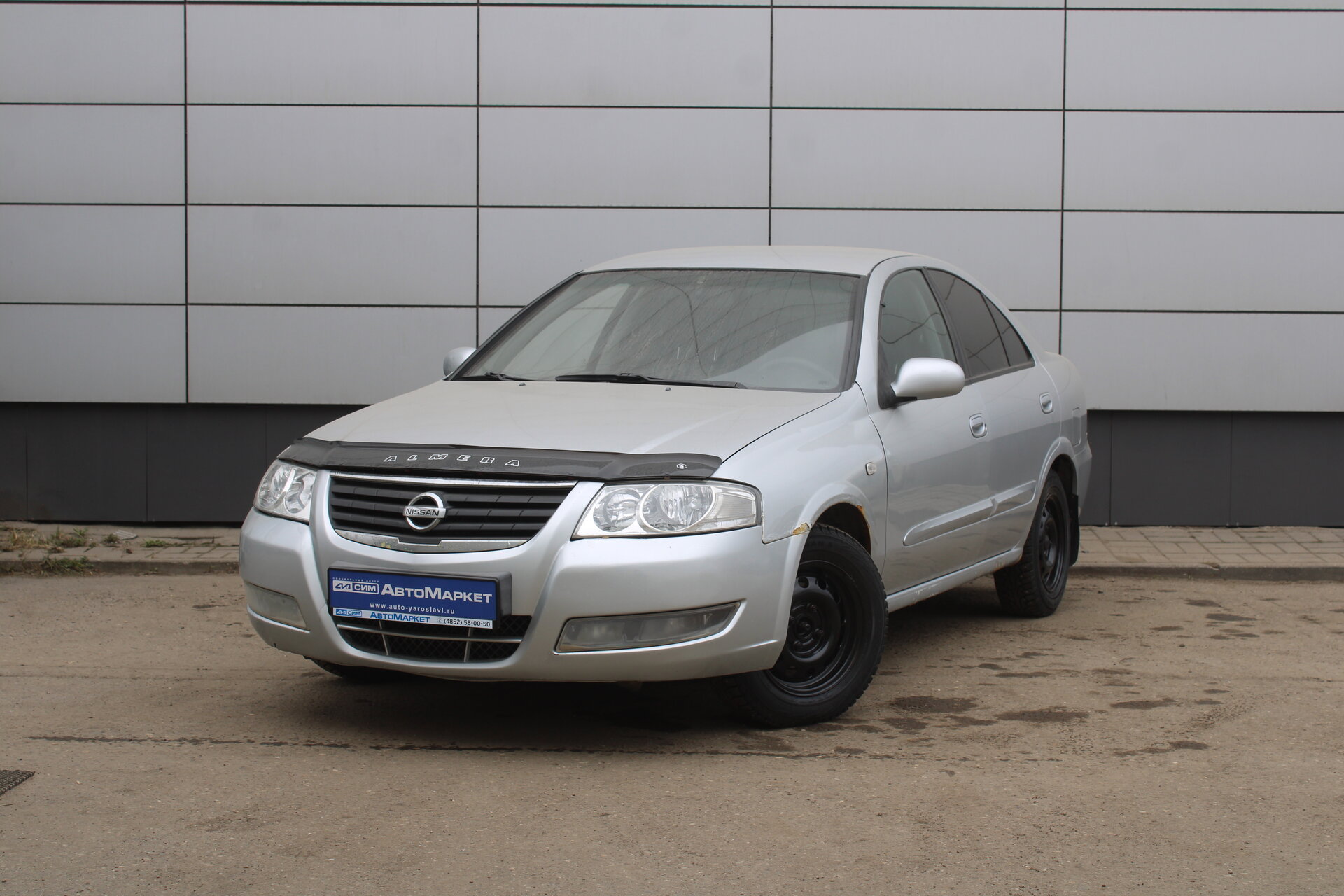 Серебряный Nissan Almera Classic 1.6 MT (107 л.с.) 2011