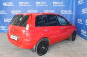 красный Ford Fusion 1.4 MT (80 л.с.) 2009 фото 4