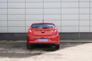 Красный Hyundai Solaris 1.4 AT (107 л.с.) 2014 фото 6
