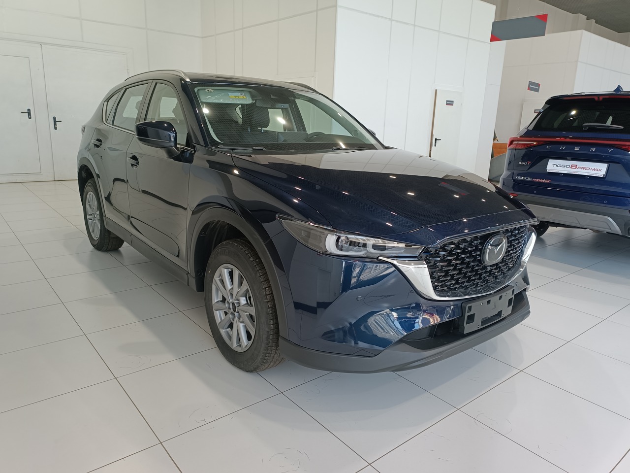 синий Mazda CX-5 2.0 AT (155 л.с.) 2024
